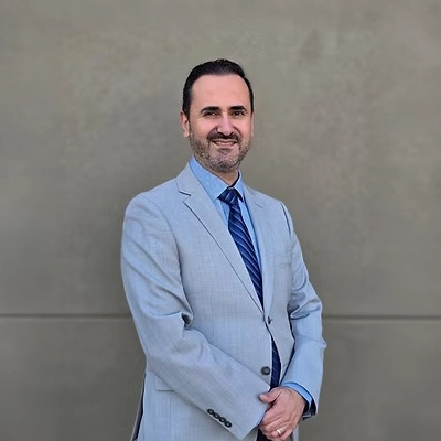 A headshot photo of Dr. Bassel