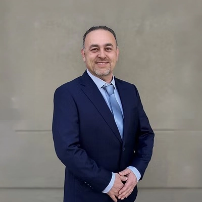 A headshot photo of Dr. Ghassan Aro